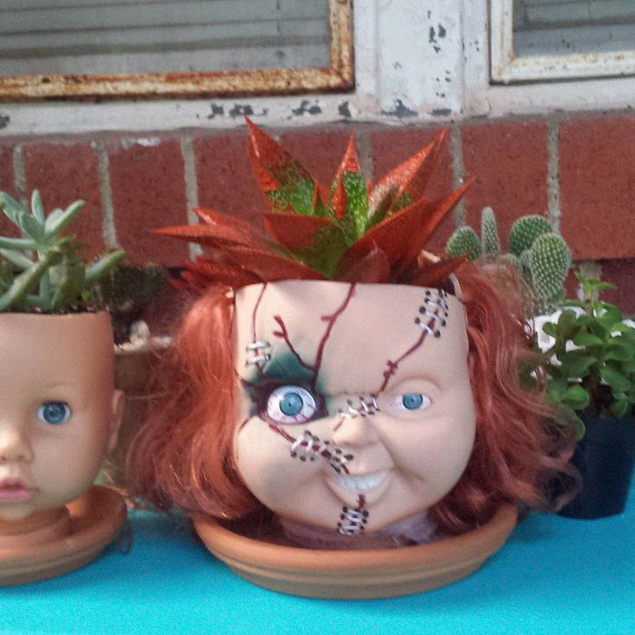 creepy doll planter 6 5ae82f84dc43a 700