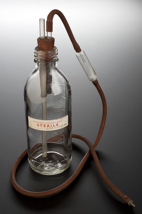 blood transfusion bottle capped with associated parts eng wellcome l0066184