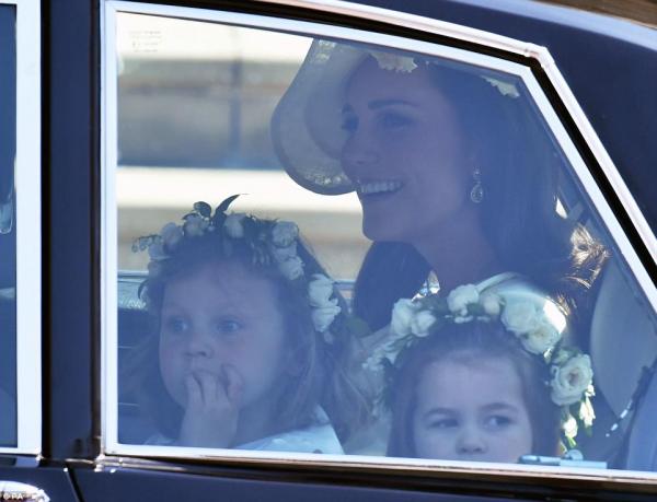 just before the bride arrived the bridesmaids and pageboys were ushered in by the duchess of cambridge who helped coax them into their positions with an encouraging hand on their shoulder