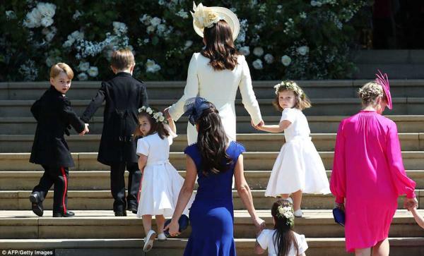 kate arrived to windsor castle hand in hand with meghans adorable flower girls and page boys including prince george far left and princess charlotte third from left as the bride to be stepped
