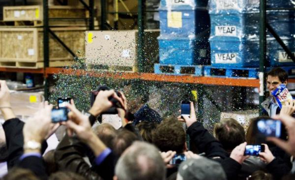 glitter is tossed into the air as republican presidential candidate and former massachusets gov mitt romney