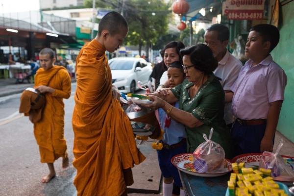 young monks during almsgiving in bangkok last month almost half of thailands monks are obese and the government is urging people to give them healthier food
