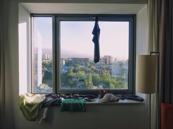 kazakhstan drying clothes at a hotel room in almaty