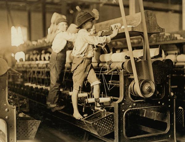 some boys were so small they had to climb up on the spinning frame to mend the broken threads and put back the empty bobbins