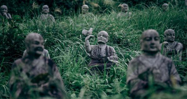 this abandoned park in japan is filled with 800 creepy statues4
