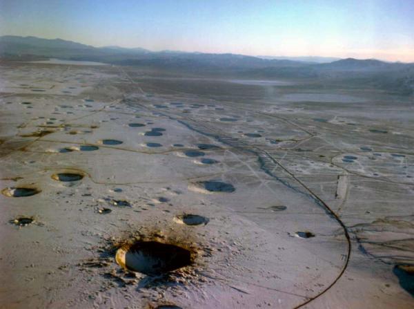 the pockmarked nevada testing site strewn with craters from all the nuclear weapons tests that took place there nnsa