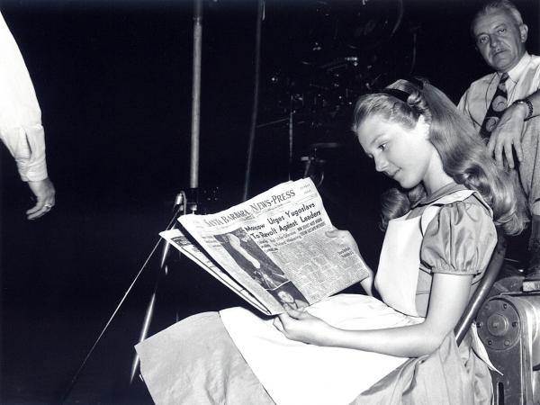 kathryn beaumont reads newspaper