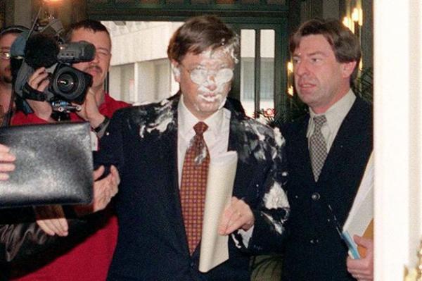 bill gates gets pie in his face on a visit to belgium
