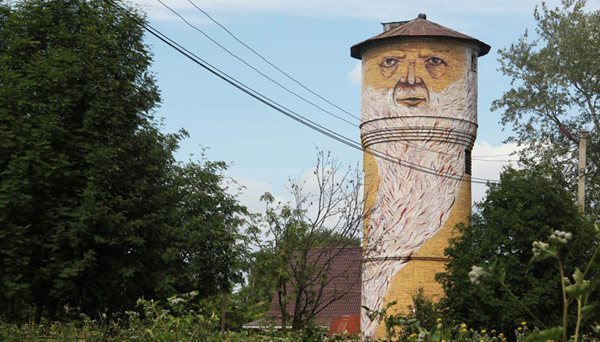 russian artist turns old buildings into the creepy watchers of your nightmares x photos 8