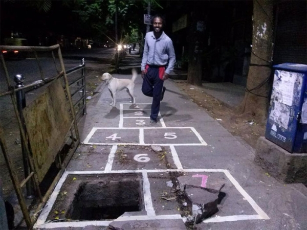 man draws attention to messed up roads in best way possible xx photos 1