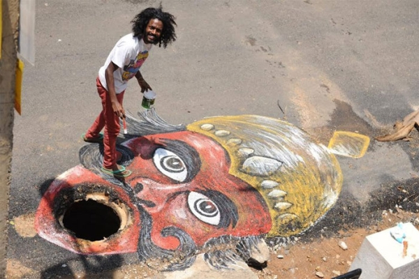 man draws attention to messed up roads in best way possible xx photos 4