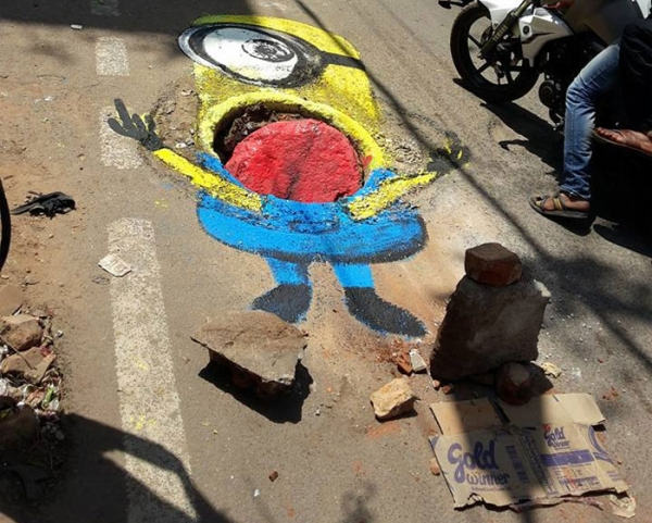 man draws attention to messed up roads in best way possible xx photos 9